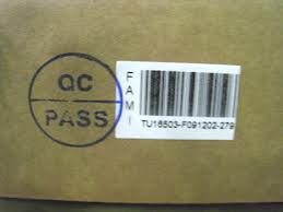 Dấu QC Pass noi that fami